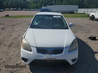 2010 Kia Rio LX with VIN KNADH4A31A6635895, listed as a Copart auction lot 61308434 with 209,016 mi miles and Salvage Title. Bid and sale history available at carsss.com. Image 5.