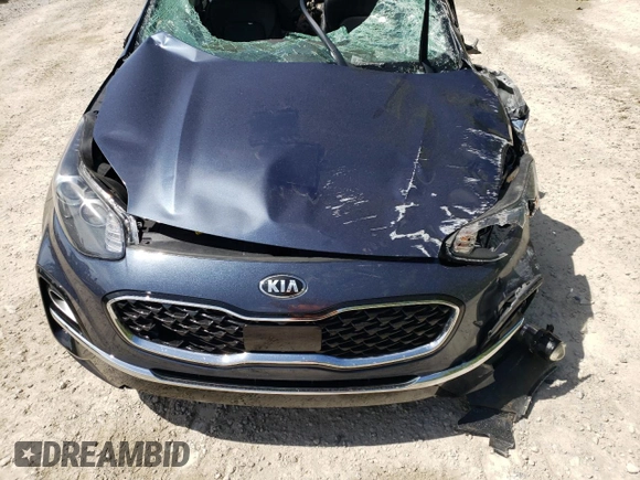 2021 Kia Sportage EX with VIN KNDPNCAC0M7847575, listed as a Copart auction lot 57667035 with Not provided miles and Salvage title. Bid and sale history available at DreamBid. Image 12.