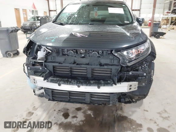 2017 Honda CR-V EX with VIN 5J6RW2H57HL059990, listed as a IAAI auction lot 41757025 with 136,533 mi miles. Bid and sale history available at carsss.com. Image 6.