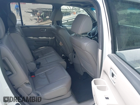 2014 Honda Pilot EX-L with VIN 5FNYF3H50EB005811, listed as a IAAI auction lot 42115804 with 216,033 mi miles and . Bid and sale history available at DreamBid. Image 8.
