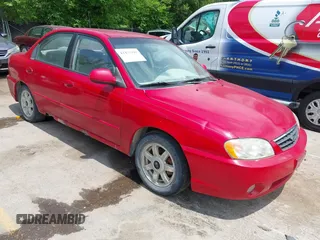 2003 Kia Spectra z VIN KNAFB121335301950, wystawiony jako IAAI lot #42433395 z przebiegiem 101 534 mil mil oraz . Historia ofert i sprzedaży dostępna na DreamBid. Obrazek 1.