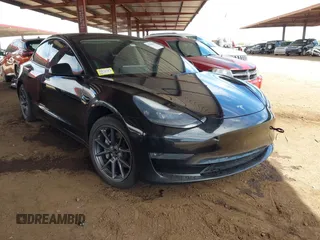 2022 Tesla Model 3 Long Range with VIN 5YJ3E1EB3NF257077, listed as a IAAI auction lot 42086629 with Not Provided miles and . Bid and sale history available at DreamBid. Image 1.