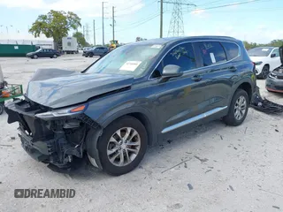 2019 Hyundai Santa Fe SE with VIN 5NMS23AD9KH037136, listed as a IAAI auction lot 41744001 with 150,745 mi miles. Bid and sale history available at carsss.com. Image 2.