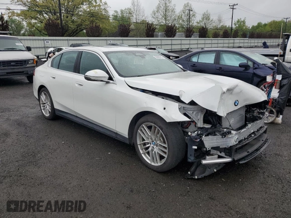 2024 BMW 5 Series 530i xDrive with VIN WBA53FJ01RCP97253, listed as a Copart auction lot 50888795 with 11,985 mi miles and Salvage title. Bid and sale history available at DreamBid. Image 4.
