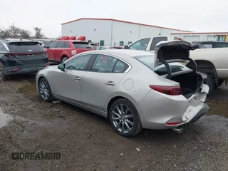 2025 Mazda 3 S Preferred with VIN JM1BPACM6S1768801, listed as a IAAI auction lot 41417279 with 1,273 mi miles and . Bid and sale history available at DreamBid. Image 3.