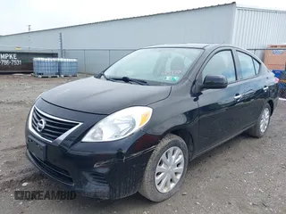 2014 Nissan Versa SV with VIN 3N1CN7AP2EK464770, listed as a IAAI auction lot 42191565 with 101,349 mi miles and . Bid and sale history available at carsss.com. Image 2.