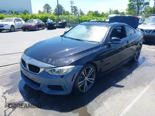 2015 BMW 4 Series 435i with VIN WBA3R1C56FK194060, listed as a IAAI auction lot 42061619 with 153,384 mi miles and . Bid and sale history available at DreamBid. Image 2.