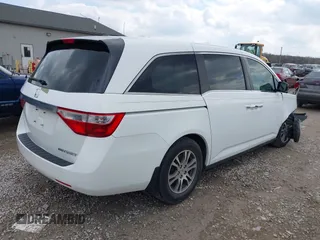2012 Honda Odyssey EX-L with VIN 5FNRL5H67CB082903, listed as a IAAI auction lot 42015904 with 208,300 mi miles and . Bid and sale history available at carsss.com. Image 4.