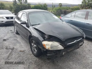 2003 Ford Taurus SES Standard with VIN 1FAFP55223A152802, listed as a IAAI auction lot 42390857 with 141,673 mi miles and . Bid and sale history available at DreamBid. Image 1.