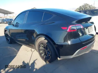 2024 Tesla Model Y Long Range with VIN 7SAYGDEEXRA216186, listed as a IAAI auction lot 41106653 with 25,331 mi miles and . Bid and sale history available at DreamBid. Image 3.