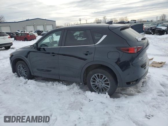 2019 Mazda CX-5 Touring with VIN JM3KFBCM0K0607933, listed as a Copart auction lot 46260815 with 64,349 mi miles and Salvage Title. Bid and sale history available at carsss.com. Image 2.