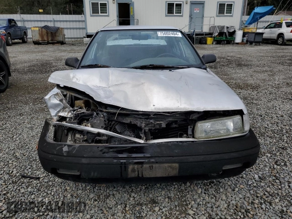 1991 Toyota Corolla z VIN 1NXAE94A8MZ234510, wystawiony jako Copart lot #75002404 z przebiegiem 188 051 mil mil oraz Szkoda całkowita • Salvage title. Historia ofert i sprzedaży dostępna na DreamBid. Obrazek 5.