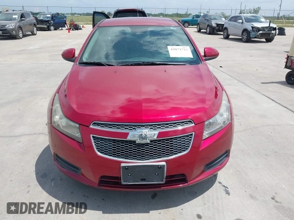 2014 Chevrolet Cruze 1LT z VIN 1G1PC5SB5E7400628, wystawiony jako IAAI lot #42071723 z przebiegiem 97 997 mil mil oraz . Historia ofert i sprzedaży dostępna na DreamBid. Obrazek 6.