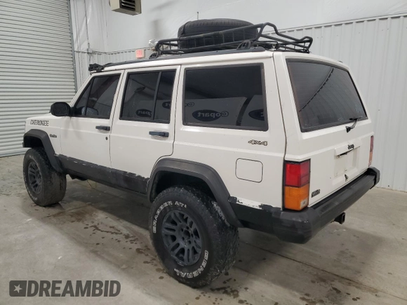 1996 Jeep Cherokee Sport with VIN 1J4FJ68S5TL235927, listed as a Copart auction lot 68942174 with 238,619 mi miles and Clean Title. Bid and sale history available at carsss.com. Image 2.