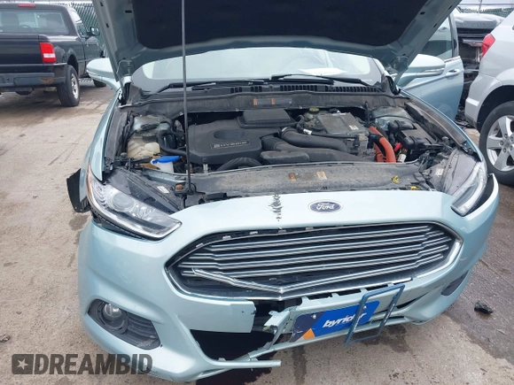 2013 Ford Fusion SE Hybrid with VIN 3FA6P0LUXDR339767, listed as a IAAI auction lot 41920621 with 135,274 mi miles. Bid and sale history available at carsss.com. Image 6.