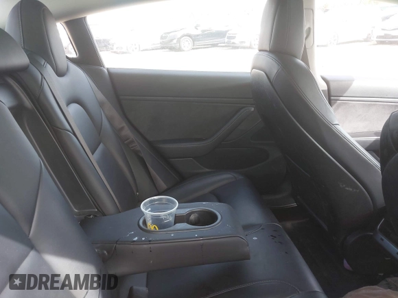 2018 Tesla Model 3 Long Range Battery z VIN 5YJ3E1EB7JF088224, wystawiony jako IAAI lot #42097665 z przebiegiem Nie podano mil oraz . Historia ofert i sprzedaży dostępna na DreamBid. Obrazek 8.