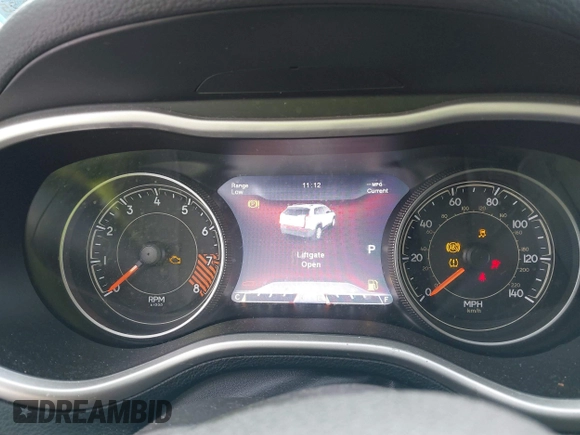 2015 Jeep Cherokee Trailhawk with VIN 1C4PJMBS9FW655233, listed as a IAAI auction lot 41430715 with 138,181 mi miles and . Bid and sale history available at carsss.com. Image 7.