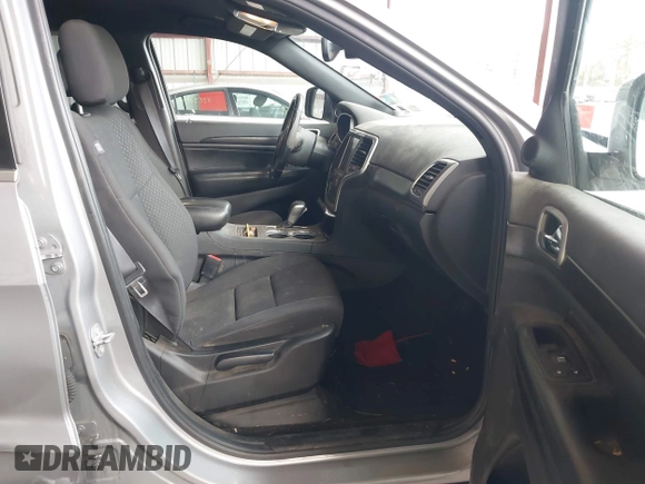 2018 Jeep Grand Cherokee Laredo E with VIN 1C4RJFAG7JC130313, listed as a IAAI auction lot 41969759 with 177,017 mi miles and . Bid and sale history available at DreamBid. Image 5.