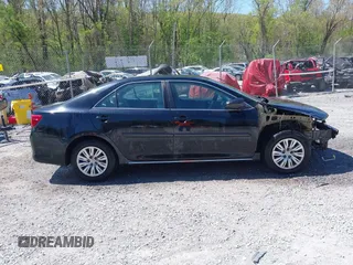 2014 Toyota Camry L with VIN 4T4BF1FK9ER408973, listed as a IAAI auction lot 42074491 with 183,934 mi miles and . Bid and sale history available at DreamBid. Image 13.