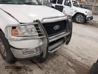 2005 Ford F-150 XLT with VIN 1FTPX14565FB60720, listed as a IAAI auction lot 41728673 with 148,187 mi miles. Bid and sale history available at carsss.com. Image 6.