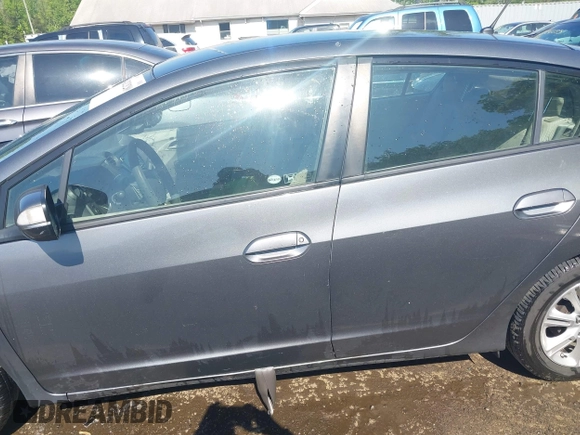 2010 Honda Insight EX with VIN JHMZE2H72AS021555, listed as a IAAI auction lot 42129289 with 172,829 mi miles and . Bid and sale history available at DreamBid. Image 15.