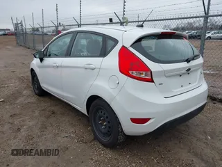 2013 Ford Fiesta SE with VIN 3FADP4EJ8DM193710, listed as a IAAI auction lot 42020003 with 95,625 mi miles. Bid and sale history available at carsss.com. Image 3.