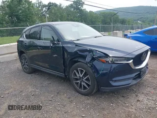 2018 Mazda CX-5 Grand Touring with VIN JM3KFBDMXJ0361812, listed as a IAAI auction lot 42509752 with 131,386 mi miles and . Bid and sale history available at DreamBid. Image 6.