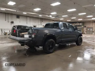 2009 Toyota Tundra 4WD Truck with VIN 5TFBW54199X091510, listed as a IAAI auction lot 42025369 with 234,784 mi miles. Bid and sale history available at carsss.com. Image 4.
