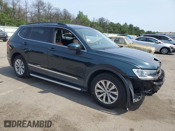 2018 Volkswagen Tiguan SEL with VIN 3VV2B7AX8JM154396, listed as a Copart auction lot 60984075 with 67,237 mi miles and Salvage title. Bid and sale history available at DreamBid. Image 4.