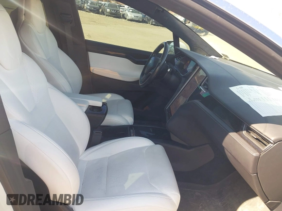 2018 Tesla Model X 75D with VIN 5YJXCAE45JF103828, listed as a IAAI auction lot 41698708 with 118,699 mi miles and . Bid and sale history available at carsss.com. Image 5.