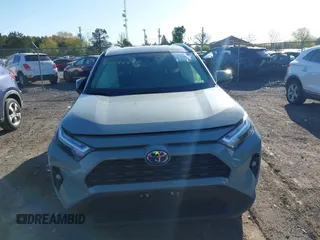 2023 Toyota RAV4 Hybrid XLE Premium with VIN JTMB6RFV3PD116696, listed as a IAAI auction lot 42044933 with 18,553 mi miles. Bid and sale history available at carsss.com. Image 12.