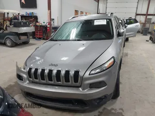 2016 Jeep Cherokee Altitude with VIN 1C4PJMCB6GW295404, listed as a IAAI auction lot 41211758 with 100,722 mi miles and . Bid and sale history available at DreamBid. Image 12.