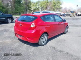2013 Hyundai Accent GL with VIN KMHCT5AE9DU099021, listed as a IAAI auction lot 42094091 with 226,420 mi miles. Bid and sale history available at carsss.com. Image 4.