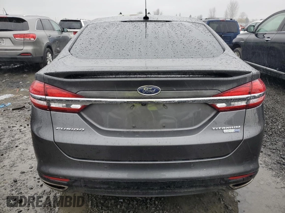 2018 Ford Fusion Titanium with VIN 3FA6P0D92JR193919, listed as a Copart auction lot 42188094 with 99,939 mi miles and Salvage title. Bid and sale history available at DreamBid. Image 6.