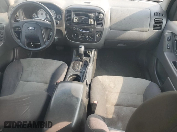 2007 Ford Escape XLS with VIN 1FMYU92ZX7KB69167, listed as a Copart auction lot 59600185 with 162,442 mi miles and Salvage title. Bid and sale history available at DreamBid. Image 8.