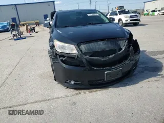 2012 Buick LaCrosse Touring z VIN 1G4GJ5E30CF227634, wystawiony jako Copart lot #61255525 z przebiegiem 133 759 mil mil oraz Szkoda całkowita • Salvage title. Historia ofert i sprzedaży dostępna na DreamBid. Obrazek 14.