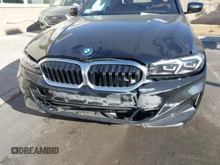 2023 BMW 3 Series 330e with VIN 3MW39FF08P8D57694, listed as a IAAI auction lot 41608900 with 19,483 mi miles. Bid and sale history available at carsss.com. Image 6.