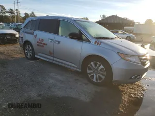 2016 Honda Odyssey Touring Elite with VIN 5FNRL5H92GB010748, listed as a Copart auction lot 48997425 with 145,251 mi miles and Salvage Title. Bid and sale history available at DreamBid. Image 4.