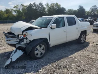 2013 Honda Ridgeline RTL with VIN 5FPYK1F58DB018007, listed as a Copart auction lot 69538464 with 165,590 mi miles and Salvage Title. Bid and sale history available at carsss.com. Image 1.