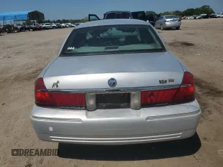 1999 Mercury Grand Marquis LS z VIN 2MEFM75W5XX673218, wystawiony jako Copart lot #52621285 z przebiegiem 163 642 mil mil oraz Szkoda całkowita • Salvage title. Historia ofert i sprzedaży dostępna na DreamBid. Obrazek 6.
