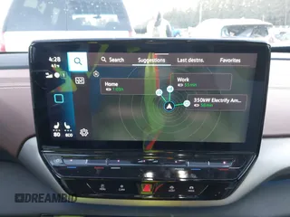 2023 Volkswagen ID.4 Pro z VIN 1V2DNPE81PC017620, wystawiony jako IAAI lot #41573053 z przebiegiem 15 462 mil mil oraz . Historia ofert i sprzedaży dostępna na DreamBid. Obrazek 19.