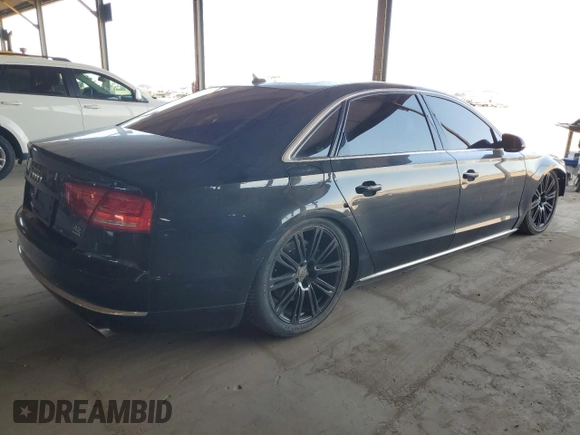 2011 Audi A8 z VIN WAURVAFD5BN019557, wystawiony jako Copart lot #54801035 z przebiegiem 148 688 mil mil oraz Tytuł czysty. Historia ofert i sprzedaży dostępna na DreamBid. Obrazek 3.