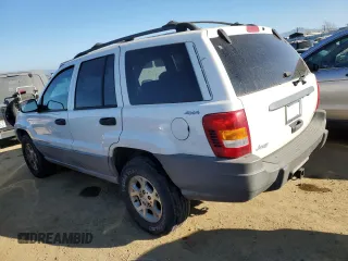 1999 Jeep Grand Cherokee Laredo z VIN 1J4GW58N8XC736438, wystawiony jako Copart lot #88605625 z przebiegiem 181 612 mil mil oraz Czysty tytuł • Clean title. Historia ofert i sprzedaży dostępna na DreamBid. Obrazek 2.