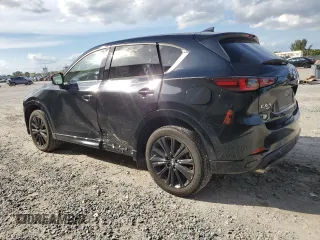 2022 Mazda CX-5 2.5 Turbo with VIN JM3KFBAY8N0619340, listed as a Copart auction lot 46217955 with 13,604 mi miles and Salvage Title. Bid and sale history available at carsss.com. Image 2.