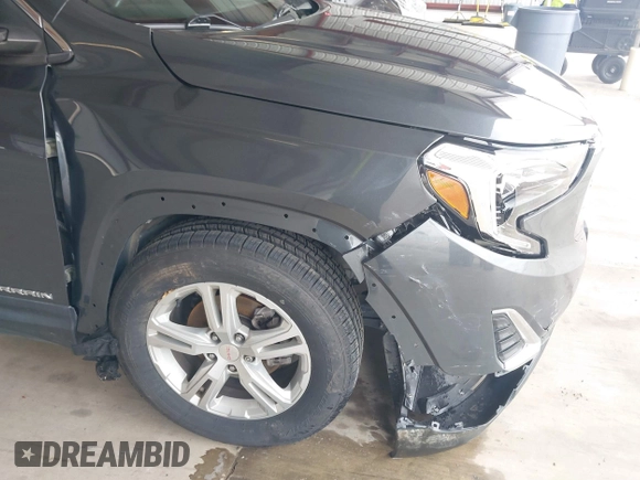 2020 GMC Terrain SLE z VIN 3GKALMEV3LL275686, wystawiony jako IAAI lot #41657384 z przebiegiem 97 501 mil mil oraz . Historia ofert i sprzedaży dostępna na DreamBid. Obrazek 6.