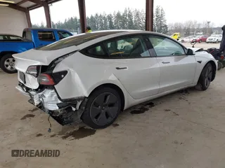2023 Tesla Model 3 z VIN 5YJ3E1EA8PF412166, wystawiony jako IAAI lot #41461983 z przebiegiem 25 908 mil mil oraz . Historia ofert i sprzedaży dostępna na DreamBid. Obrazek 4.