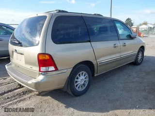 1999 Ford Windstar Wagon SE with VIN 2FMZA5249XBB38156, listed as a IAAI auction lot 42044714 with 199,285 mi miles. Bid and sale history available at carsss.com. Image 4.