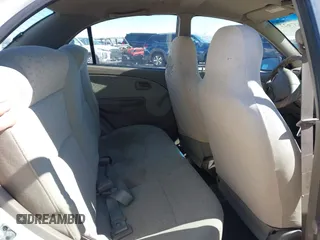 2003 Kia Rio with VIN KNADC125836211761, listed as a IAAI auction lot 41637622 with 117,010 mi miles. Bid and sale history available at carsss.com. Image 8.