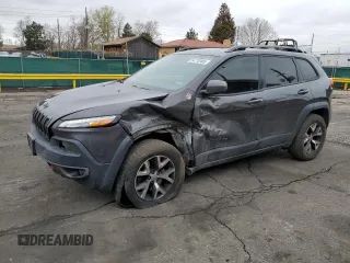 2016 Jeep Cherokee Trailhawk z VIN 1C4PJMBB0GW164437, wystawiony jako Copart lot #54776985 z przebiegiem 158 801 mil mil oraz Szkoda całkowita • Salvage title. Historia ofert i sprzedaży dostępna na DreamBid. Obrazek 1.