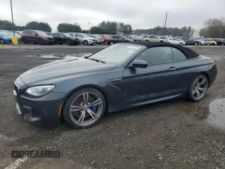 2013 BMW M6 z VIN WBSLZ9C55DDZ77804, wystawiony jako Copart lot #54121185 z przebiegiem 66 286 mil mil oraz Czysty tytuł • Clean title. Historia ofert i sprzedaży dostępna na DreamBid. Obrazek 1.